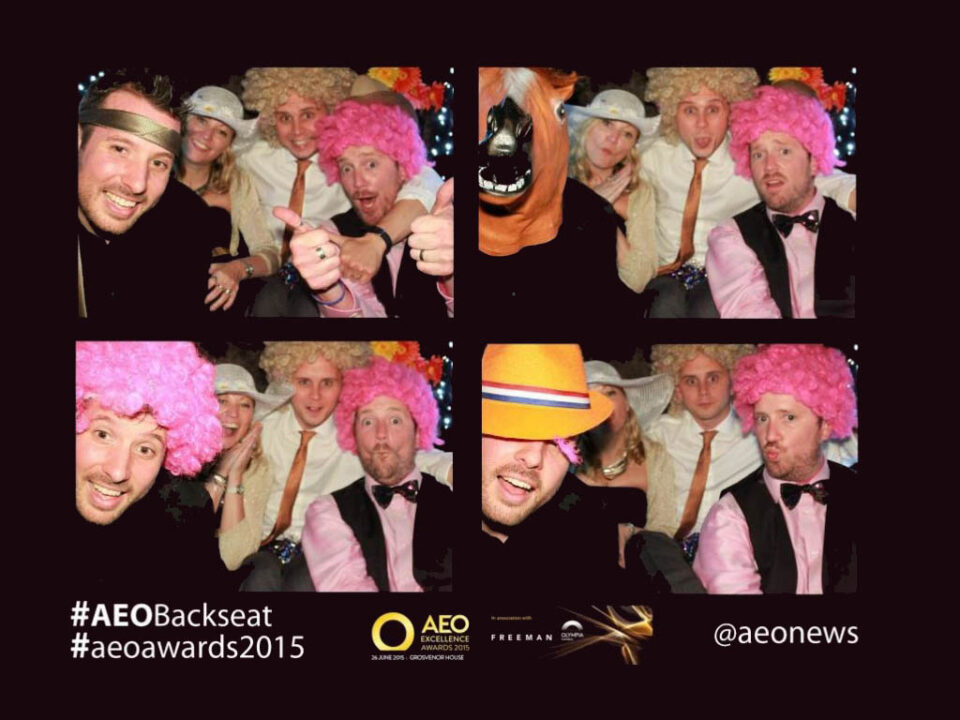 A photo booth collage featuring individuals in costumes and props at the AEO Awards 2015 event.